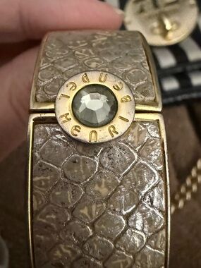 Henri Bendel hinged Gold/Brown Tone Snake-Embossed Bracelet with Crystal Accent